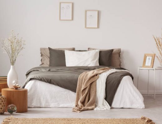 spacious bedroom interior in beige and olive colour